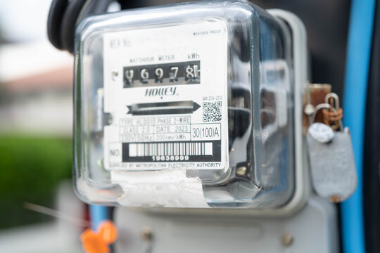 Electric measuring power meter for energy cost at home and office.
