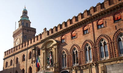 Historic palazzo d'accursio, also known as palazzo comunale, featuring its grand clock tower in bologna italy. © Claudio Caridi