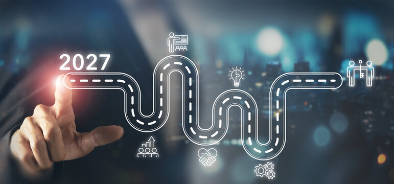 2027 Business Roadmap and Growth Strategy Concept. 2027 business roadmap, strategic planning, leadership, innovation, teamwork, partnership, operations and organizational growth toward future success.