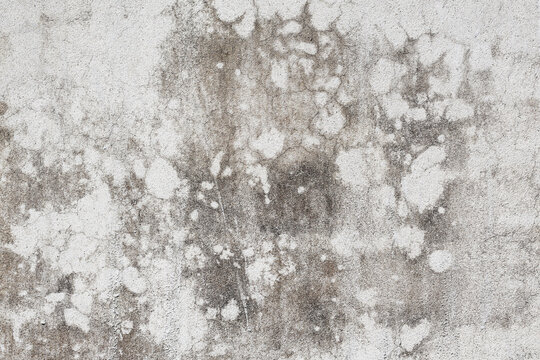 Close-up view of aged, textured paper surface with visible wear and tear for vintage document effects