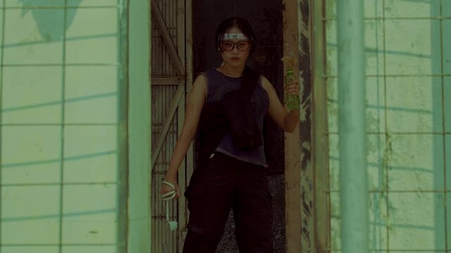 Woman in Doorway of Abandoned Building