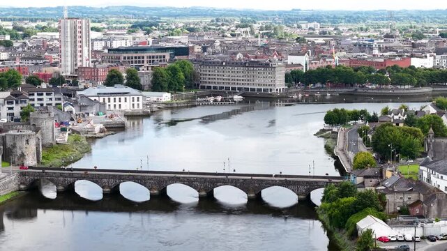 Limerick city panorama over the river with old bridge and castle to city centre. Ireland