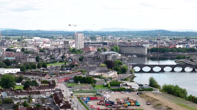 Limerick drone cityscape with city landmarks and Shannon River. Ireland urban landscape