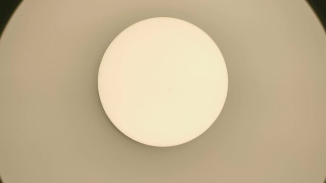 Light Switch Turning On and Off, Indoor Lighting Activation, Electric Lamp Flickering, Room Illumination, Brightness Change, Power Control, Ceiling Fixture, Household Electricity, Dark to Light