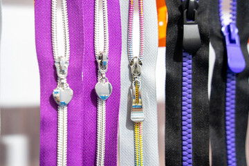 Different Types Of Colorful Zippers Displayed In A Row © Zhaorui