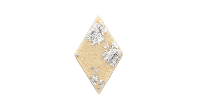 Kaju Katli diamond shaped Indian sweet with silver leaf isolated