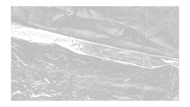 Transparent wrinkled plastic sheeting with strong light reflections and shadows creating abstract texture.