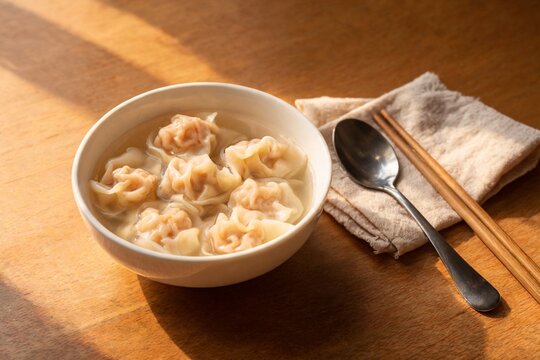 Wonton soup with pork and shrimp wontons in clear broth