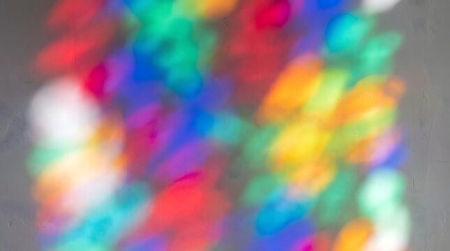 Stained glass light cast colored pools ruby blue green texture