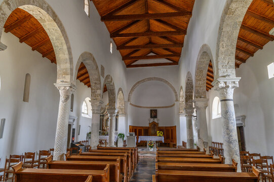 Interior of Krk Cathedral with Romanesque arcades, spiral column and wooden truss roof looking towards the altar, Krk island, Croatia