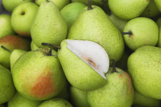 Many fresh pears as background	