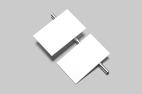 white business card with a round metal on gray background 3D rendered