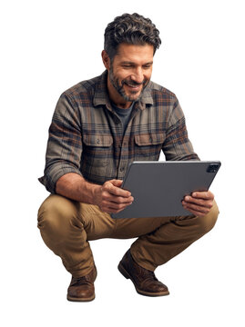 Caucasian man squatting and using digital tablet device