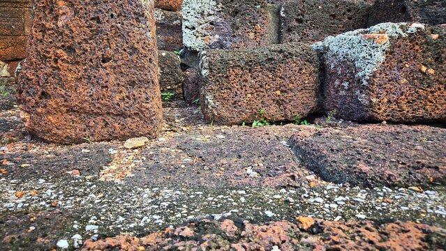 Old Laterite Stone Block Structure Background for Archaeological , Ancient , Heritage, and Historical Buildings.
