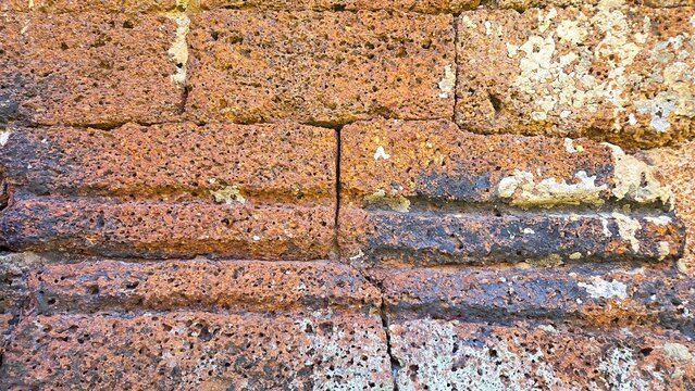 Old Laterite Stone Block Structure Background for Archaeological , Ancient , Heritage, and Historical Buildings.