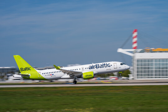 airBaltic Airbus A220-300, registration YL-CSB, touching down on Runway 08R at Munich Airport (MUC/EDDM).