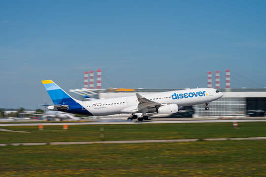 Discover Airlines Airbus A330-300, registration D-AIKK, touching down on Runway 08R at Munich Airport (MUC/EDDM)