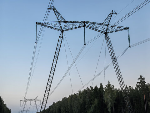 High Voltage Steel Tower Against Clear Sky Detail