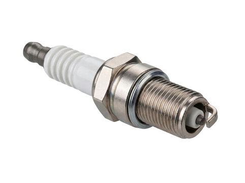 A metal spark plug with a white ceramic insulator, ready to ignite an engine
