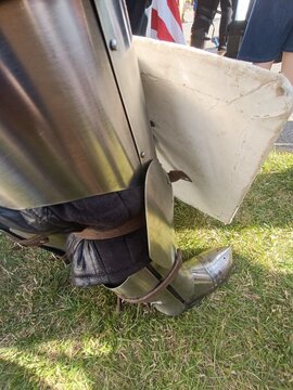 Medieval Armor and Shield Close-Up on Grass at Historical Reenactment