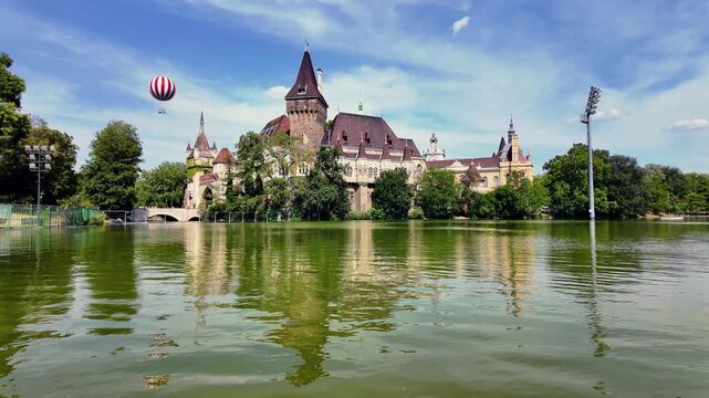 Vajdahunyad Castle and tranquil lake in Budapest's Varosliget Park
