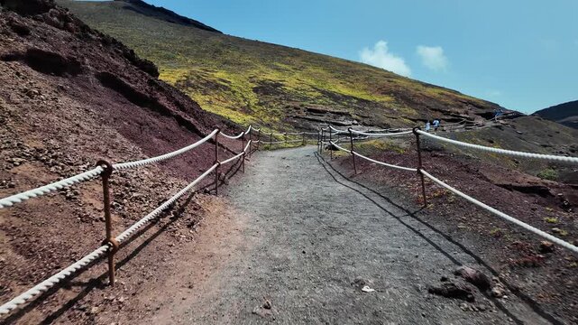 Volcanic hiking trail with rope railings, El Golfo, Lanzarote, Spain