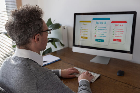 SaaS concept software as a service, subscription concept, subscription plan for online service, business man choosing online education course, buy monthly access