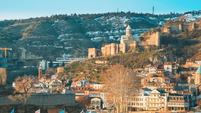 early spring season. hyperlapse Tbilisi, Georgia timelapse time lapse Scenic View Of Impregnable Fortress Narikala Fortress And Church Of St. Nicholas. Morning traffic. Metekhi Church And The