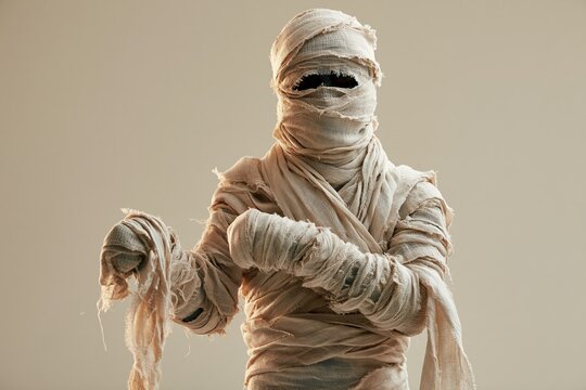 Mummy wearing bandages for Halloween, spooky monster character concept