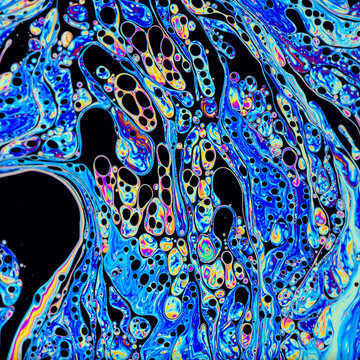 Abstract iridescent soapy surface pattern