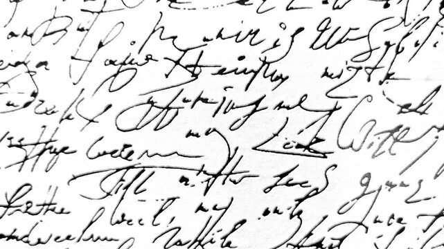 Abstract closeup of vintage cursive handwriting in black ink on a white paper textured background for creative design projects.