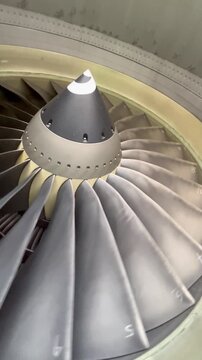 The aircraft engine is visible from below and is spinning like UFO
