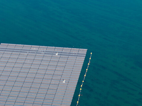 Aerial view of the floating solar system on Cottbuser Ostsee, a former open pit mine, undergoing repair works following storm damage in Cottbus, Brandenburg, Germany.