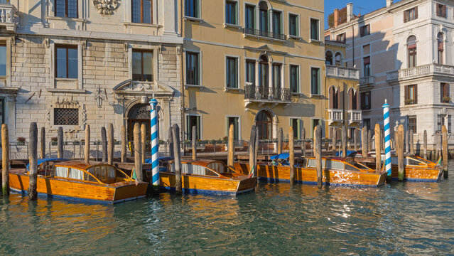 Brown Wood Taxi Boats Parked at Grand Canal in Venice Italy Sunny Winter Day Travel