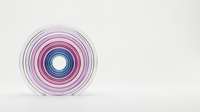 Transparent plastic circular rings with concentric colorful patterns as PNG cutout