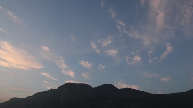 sunset clouds hovering over klein mountains, stanford, south africa