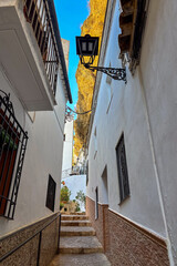 Setenil de las Bodegas is a famous cave house town featuring homes built beneath massive rock overhangs in Cadiz, Andalusia, Spain  © Olga Biliak