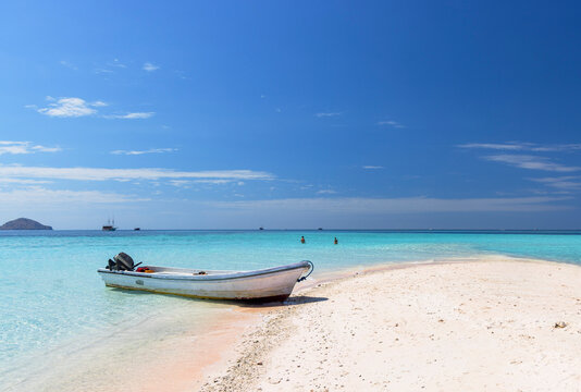 Couple on sandbank of Taka Makasar, Komodo National Park (UNESCO World Heritage Site), Lesser Sunda Islands, Indonesia