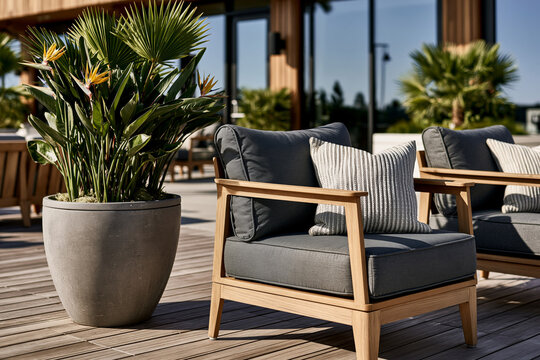 Rugged fiberstone planters with mature tropical plants on a luxury rooftop garden, modern outdoor living design, natural morning light