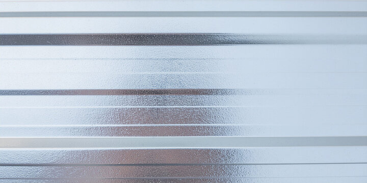 corrugated zinc coated galvanized metal panel texture parallel striped metallic steel wall background