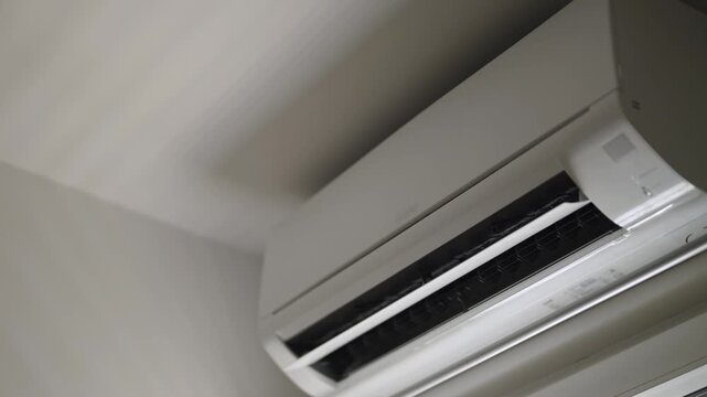 Air conditioner operating with moving vent.