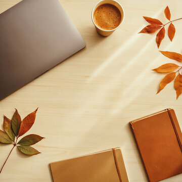 Overhead view of a cozy autumn remote work desk
