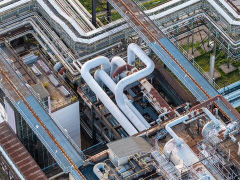 Aerial view of the Heizkraftwerk Klingenberg combined heat and power plant featuring complex industrial piping systems, metal structures, and technical infrastructure in Berlin, Berlin, Germany.
