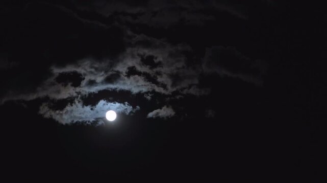 Clouds in sky time lapse with moon
