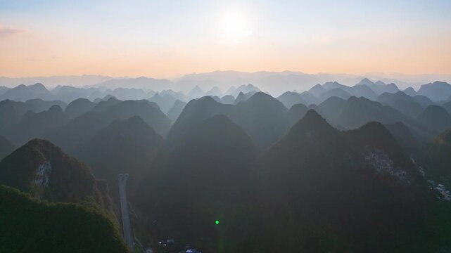 Sunset over the karst mountains of Fengshan County, Hechi City, Guangxi.
