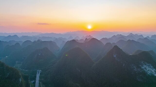 Sunset over the karst mountains of Fengshan County, Hechi City, Guangxi.