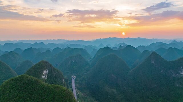 Sunset over the karst mountains of Fengshan County, Hechi City, Guangxi.