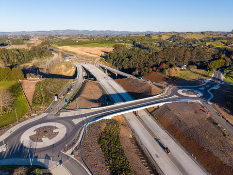 The construction of a new highway, the Takitimu North Link in the Bay of Plenty, New Zealand. The new road is passing under an existing overpass 