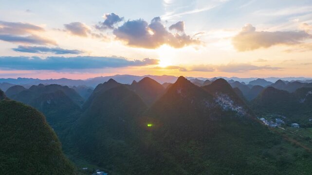 Sunset over the karst mountains of Fengshan County, Hechi City, Guangxi.