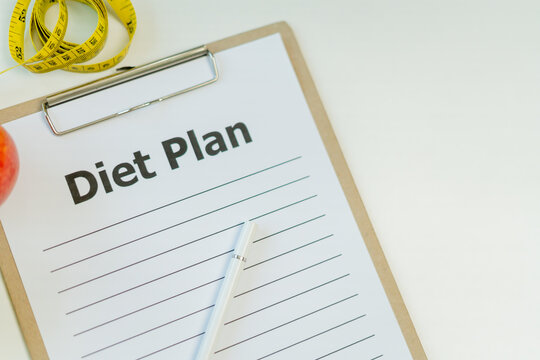 Diet and dieting. diet plan and check calories for healthy food. weight loss, lose, balance, control, reduce fat, low calories, routines, exercise, body shape, healthy foods.